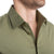 Green button-up shirt with built-in support looks sharp and feels comfortable all day.