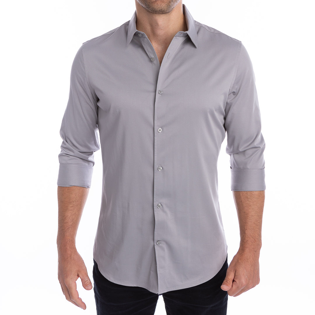 Versatile grey shirt worn tucked and untucked stays sharp in any setting.