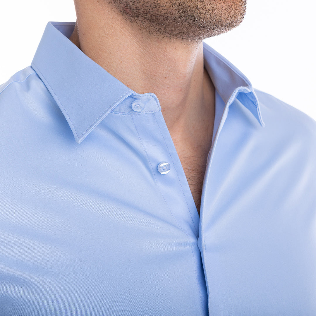 Side-by-side comparison of goTIELESS light blue shirt with structured collar versus floppy traditional shirt.