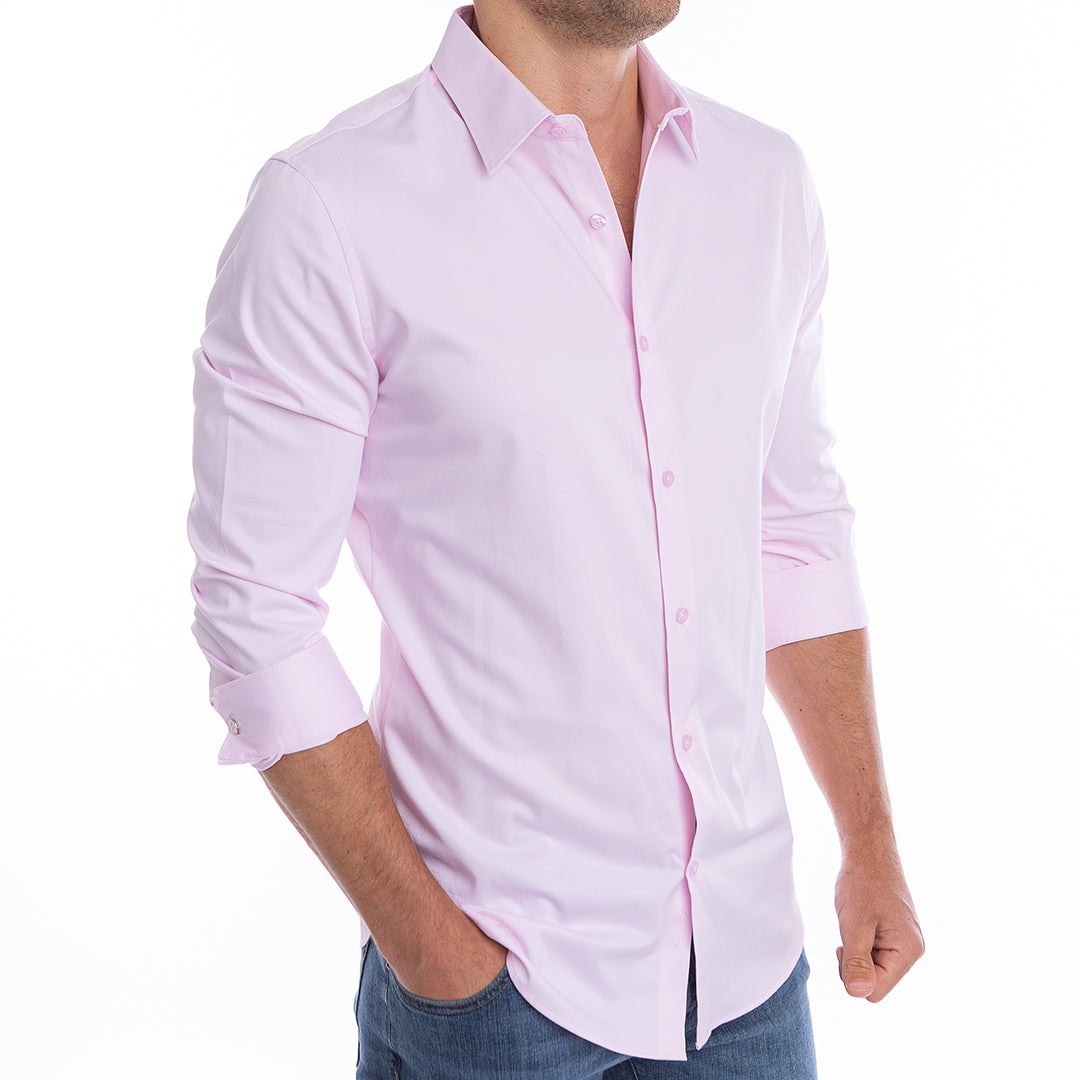 Light pink button-up shirt for men collar won’t collapse thanks to built-in placket reinforcement.